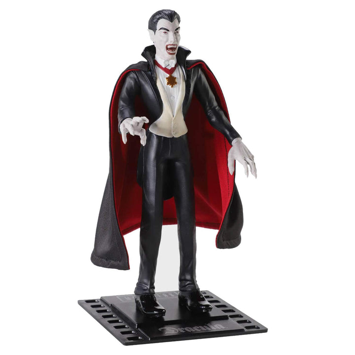 A collectible action figure of Dracula standing on a black display base against a plain white background.