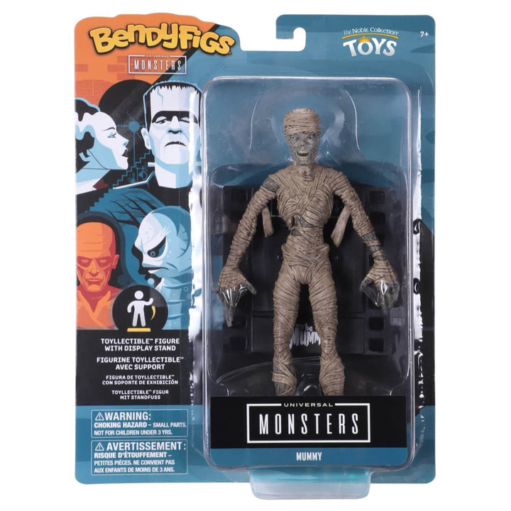 Universal Monsters Mummy toy figure in its original BenyFigs Workster blister card packaging, featuring a detailed mummy action figure with clawed hands and a stand.
