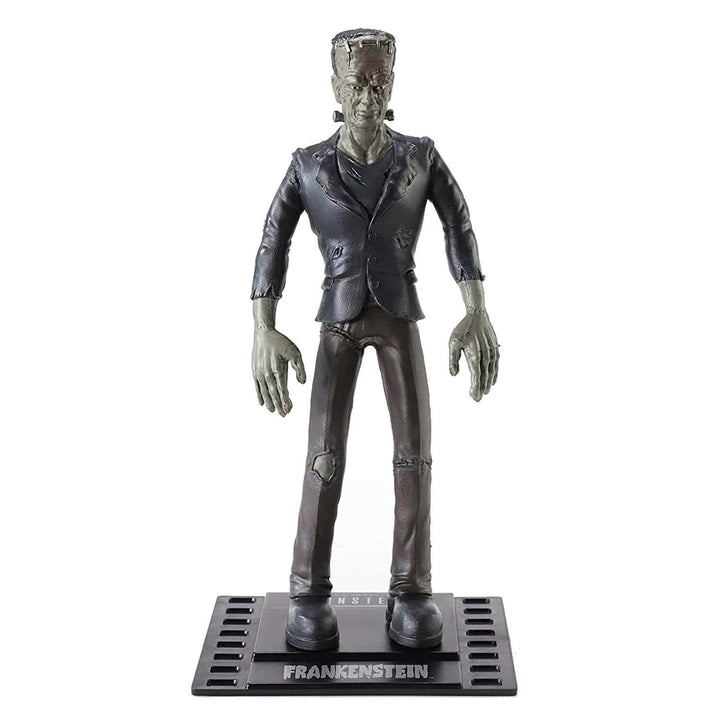 A collectible action figure of Frankenstein's monster on a black display base, photographed against a solid white background.
