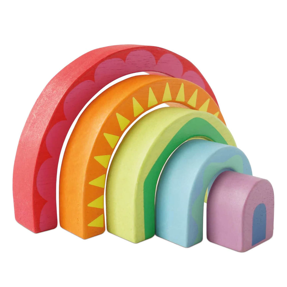 Set of colorful wooden rainbow-shaped blocks on a white background