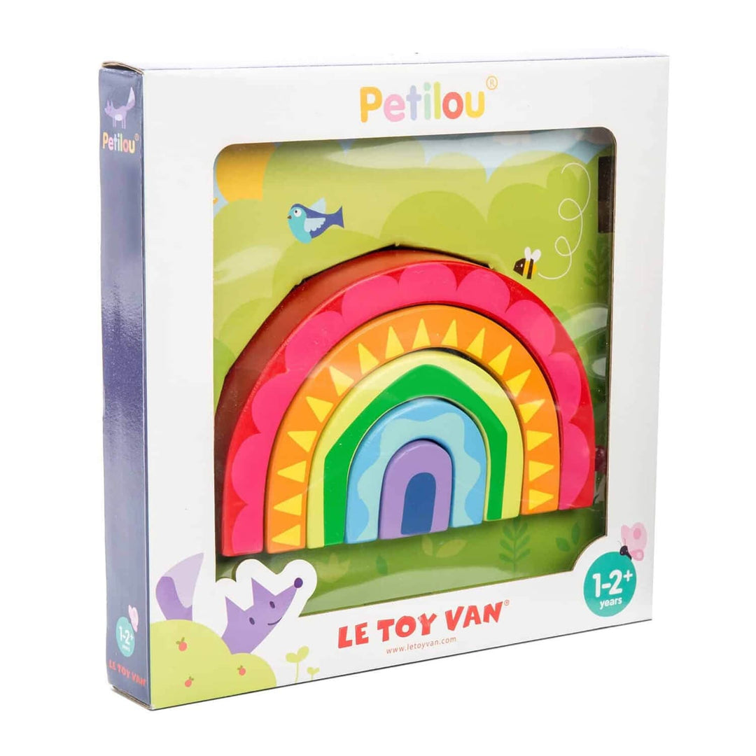 Colorful toy rainbow in Le Toy Van packaging with Petilou branding.