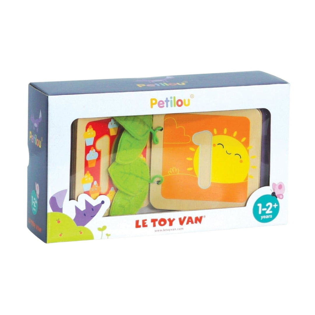 Le Toy Van Petilou puzzle packaging with colorful illustrations on a white background