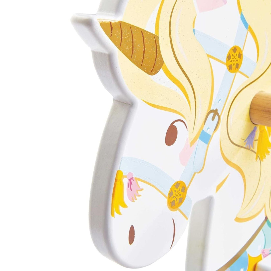 unicorn character on rocking horse with golf glitter paint finish in pastle colours