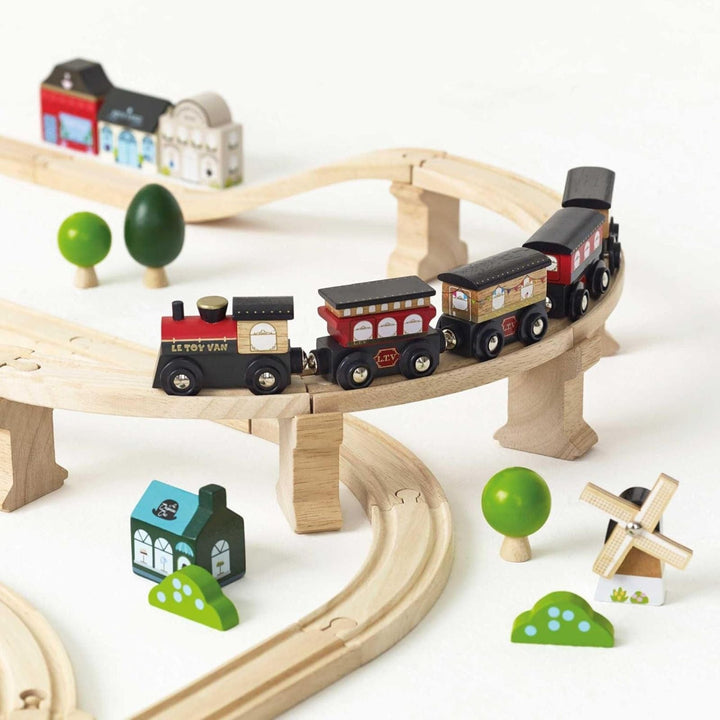 detail shot of le toy van branded train set on wooden tracks