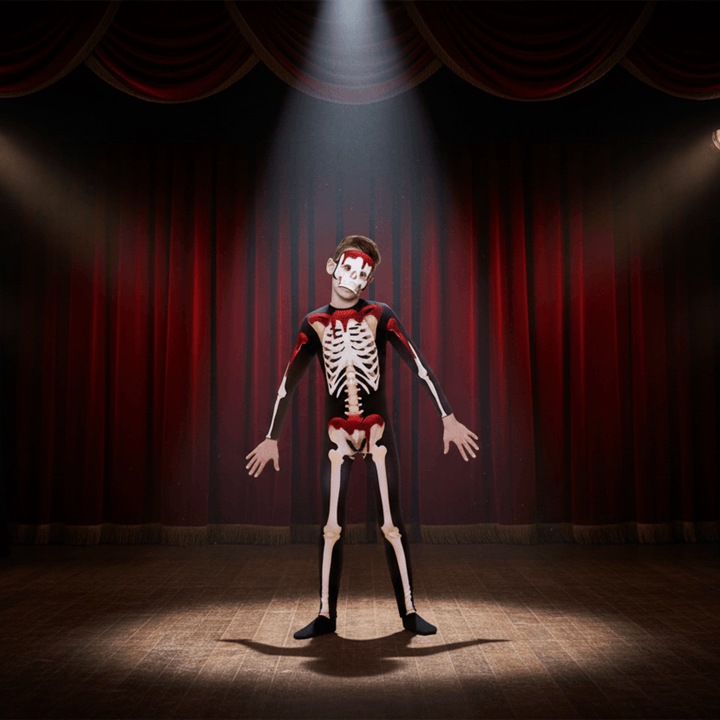 Person in a skeleton costume on a stage with red curtains