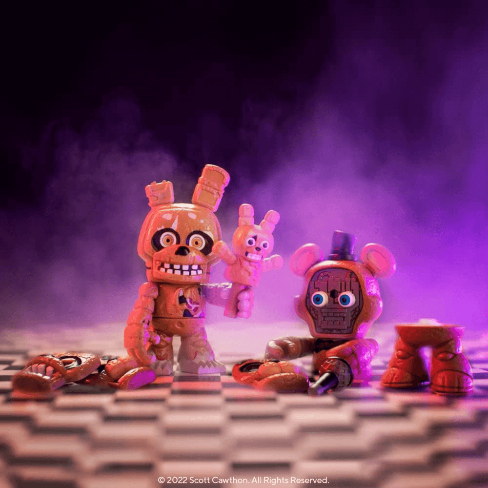 springtrap and freddy character figures in spooky room with face pieces on floow and springtap folding mini springtrap