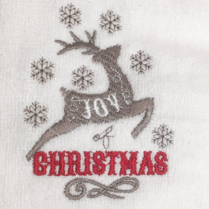 Embroidered design of a reindeer with 'Joy of Christmas' text on a white background