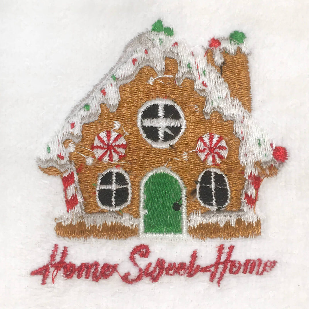 Embroidered gingerbread house with 'Home Sweet Home' text on a white background