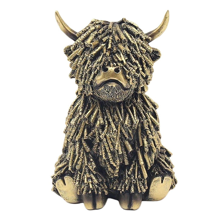 Bronze sculpture of a highland cow on a white background