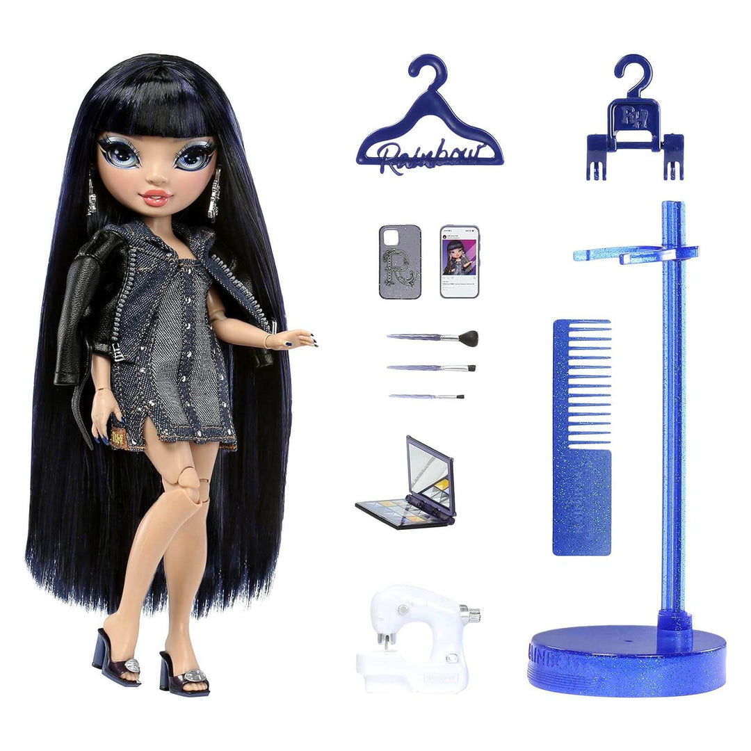 Kim from Rainbow High doll with long black hair and fashion accessories including a hanger, phone, and sewing machine.