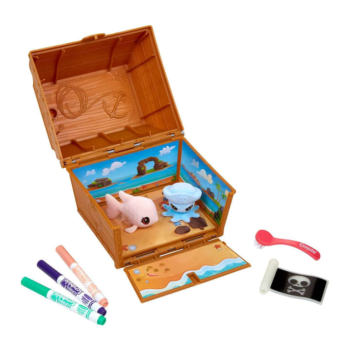 Toy chest with shark figures, markers, and a magnifying glass on a white background