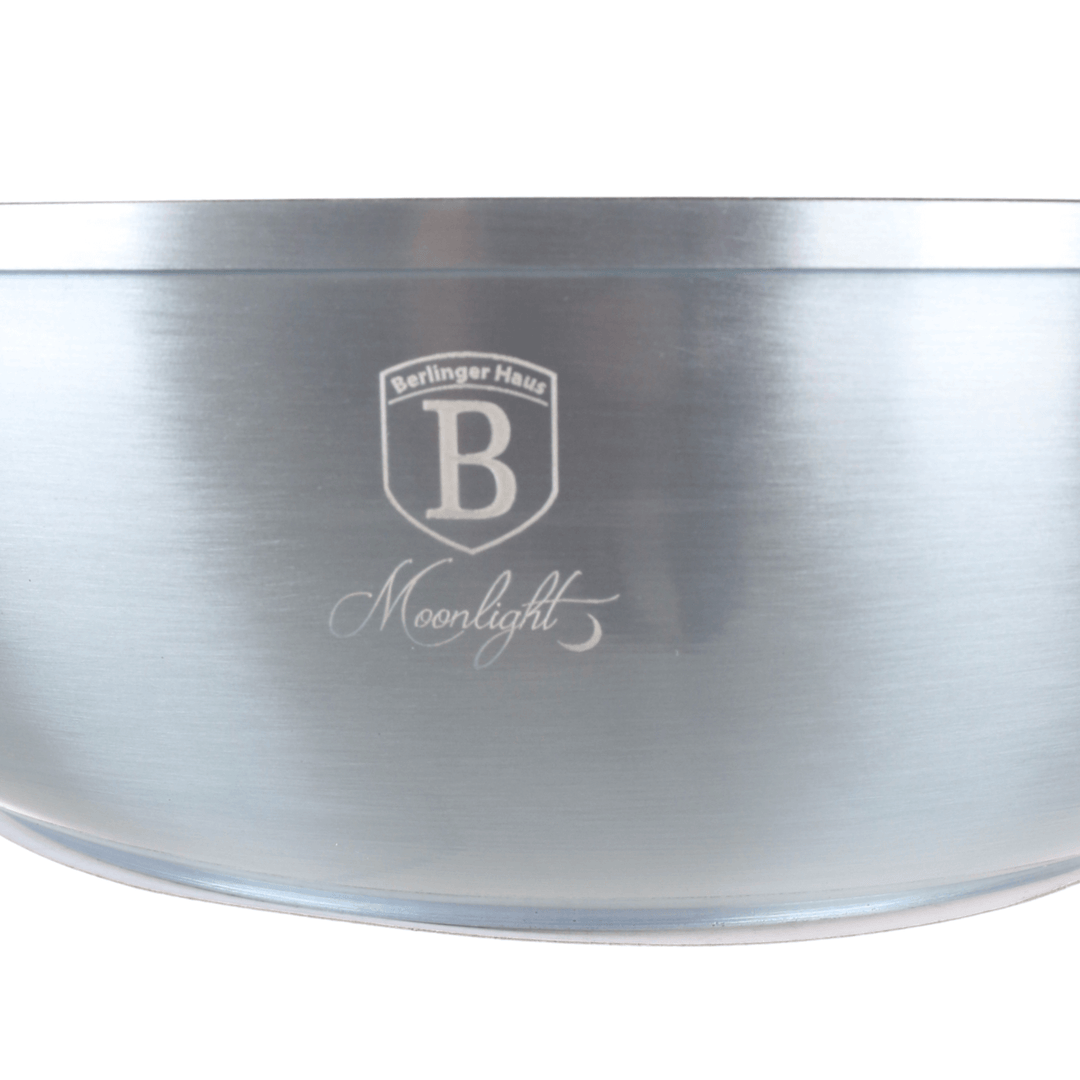 Metallic wok with 'Berlinger Haus' logo and 'Moonlight' text on a white background