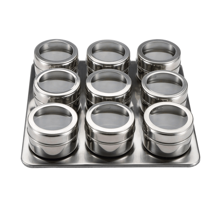 silver stainless steel spice jars on magnetic chrome silver tray