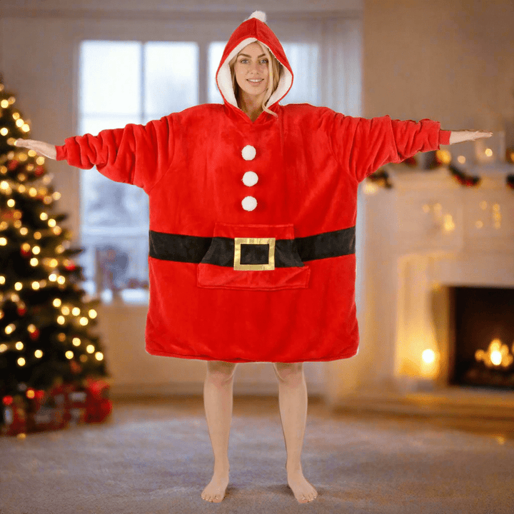 Lady wearing the Oversized hoodie in a Warm living room. 