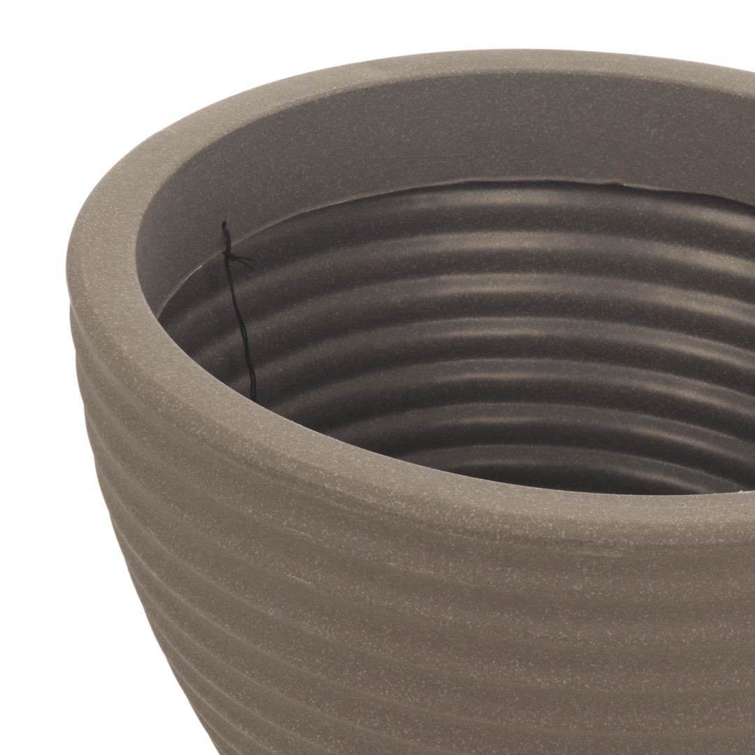 detail shot of plant pot opening with ridge detail on the inside