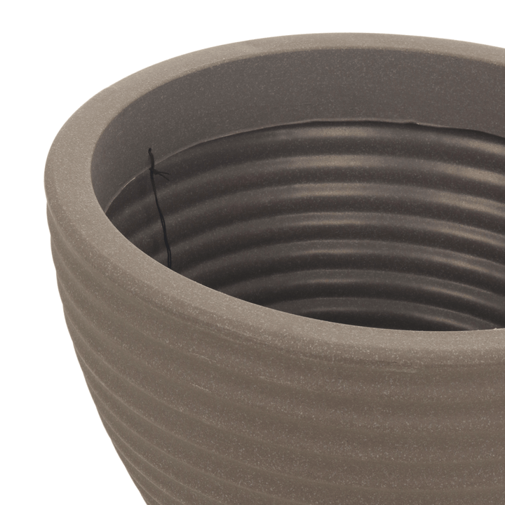 detail shot of plant pot opening with ridge detail on the inside