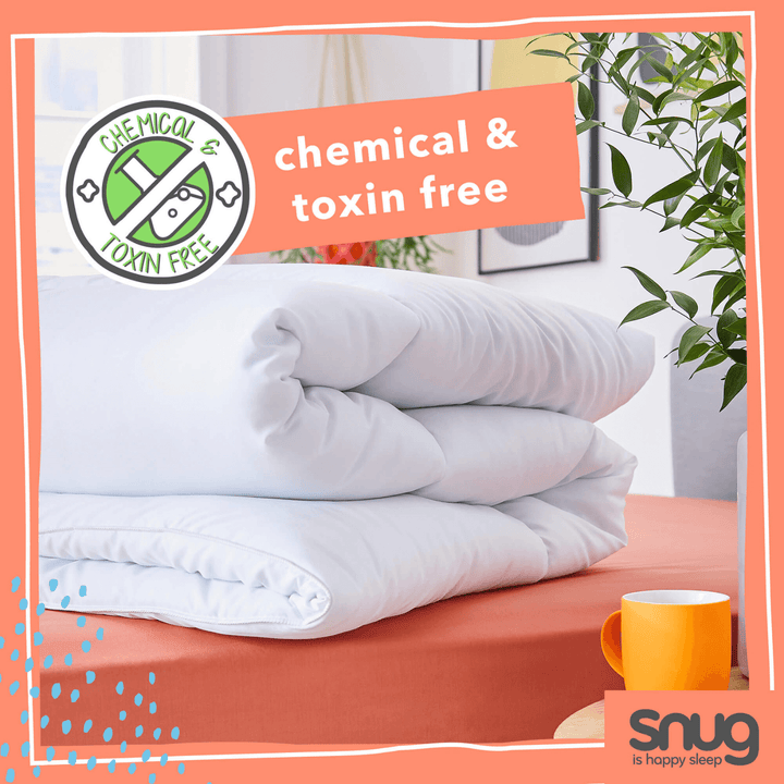 duvet folded on a bed with 'chemical & toxin free' label and 'snug' branding.