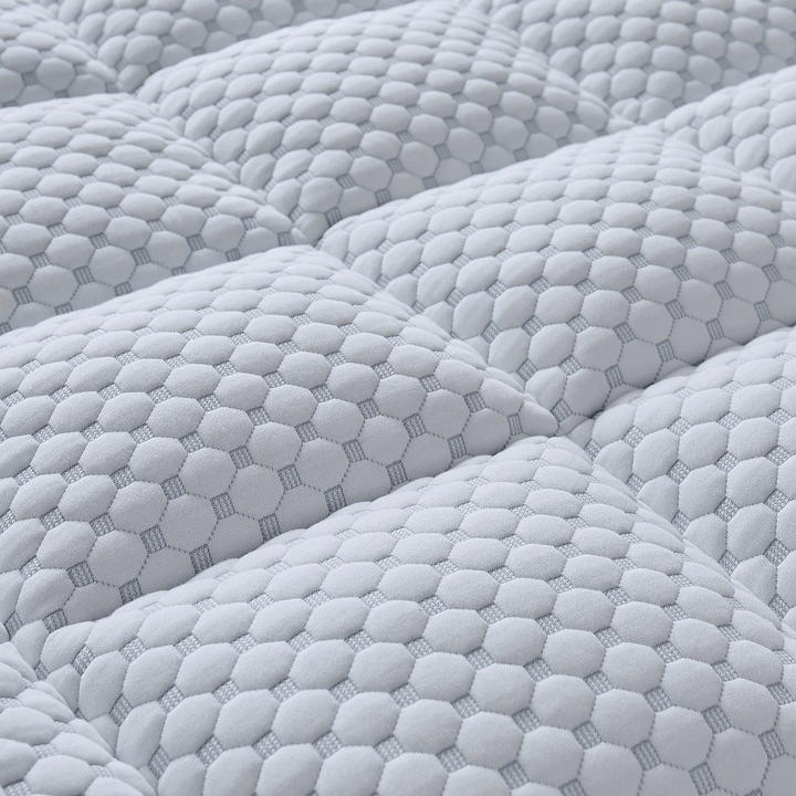 Close-up of textured gray fabric with a honeycomb pattern