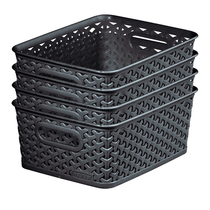storage baskets nested inside each other on white background space