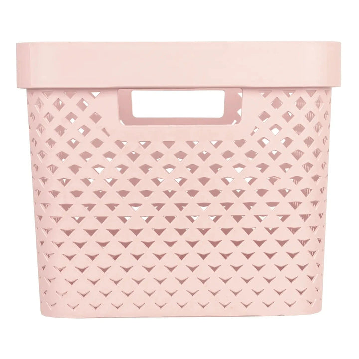 Side view of handle and pattern on a medium size pink Curver Pure storage basket