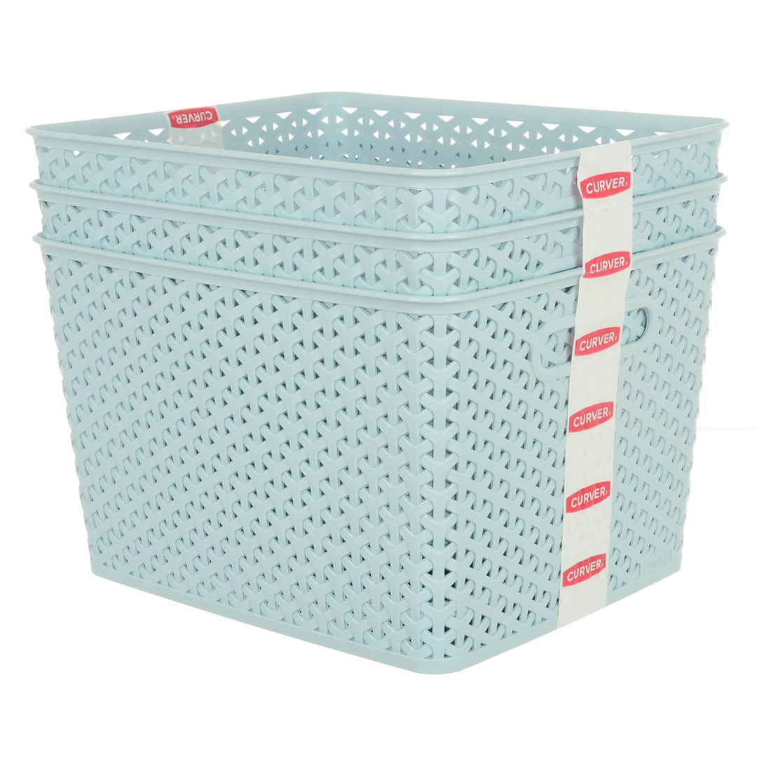 Set of 3 stacked blue storage baskets with Curver branded tape