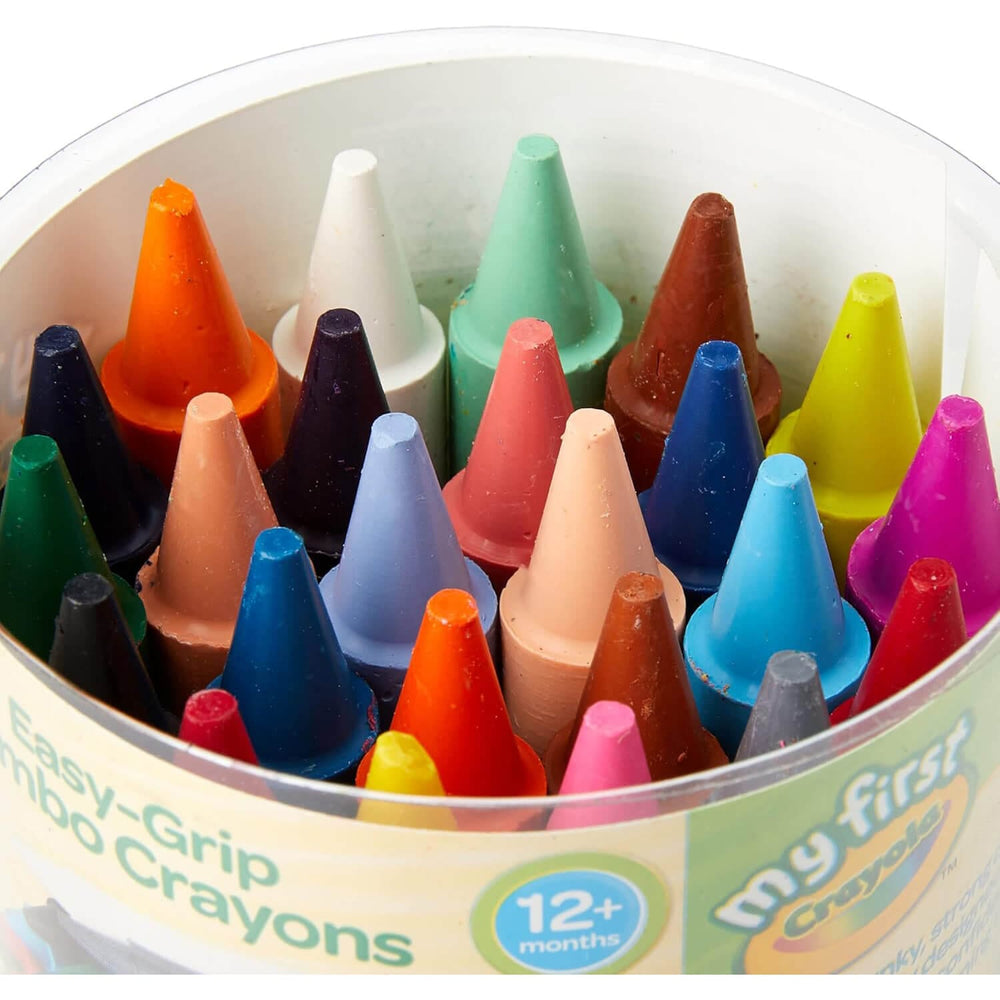 Close up of the tips of easy grip jumbo crayons in a tub