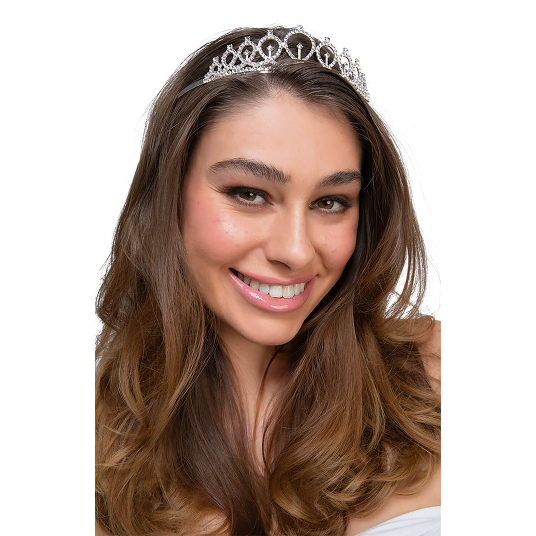 Woman wearing a silver diamante tiara for fancy dress parties
