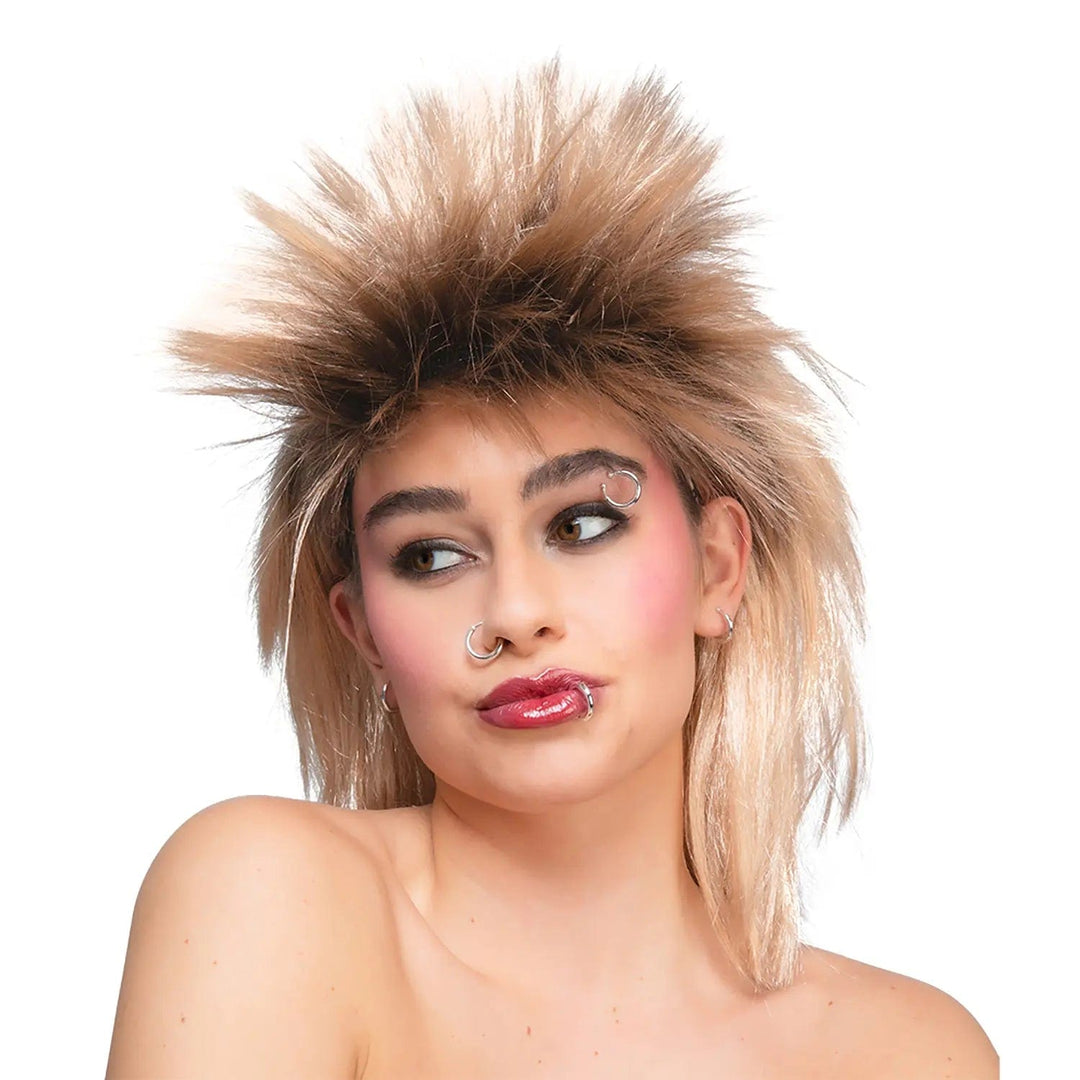 Lady wearing a punk wig and silver fake piercing rings in her ears, lip, nose and eyebrow