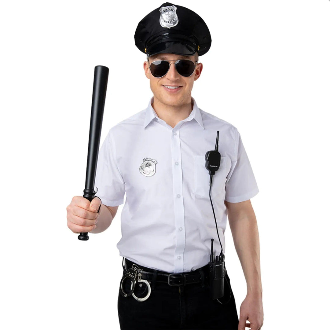 Man dressed up as a police officer with hat, sunglasses, badge, handcuffs, radio and baton