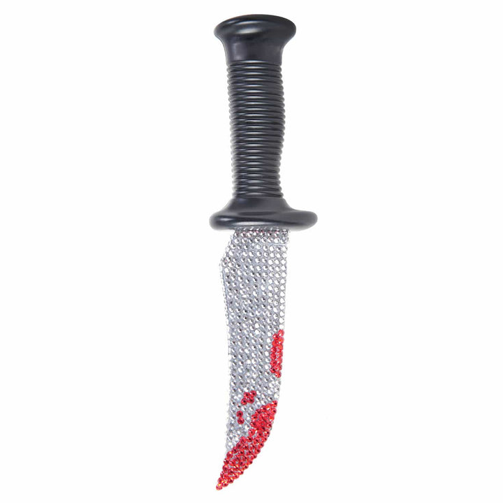 A toy or costume prop dagger with a black ribbed handle and a silver ad red rhinestone decorated blade shown on a plain white background.