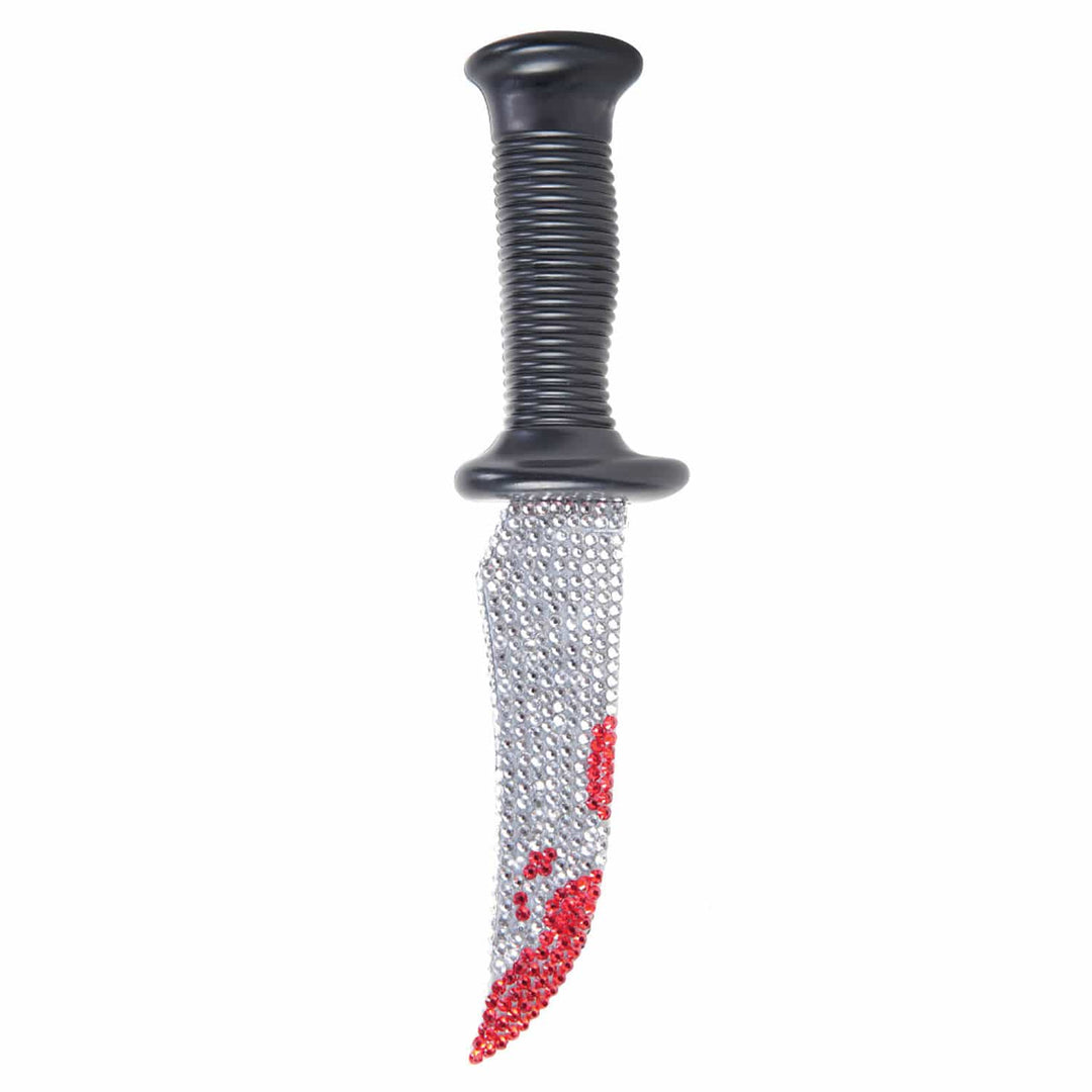A toy or costume prop dagger with a black ribbed handle and a silver ad red rhinestone decorated blade shown on a plain white background.