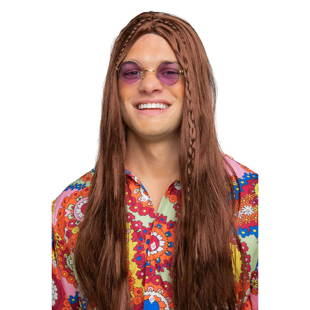 Person wearing a brown wig, purple tinted glasses and hippie shirt on a white background