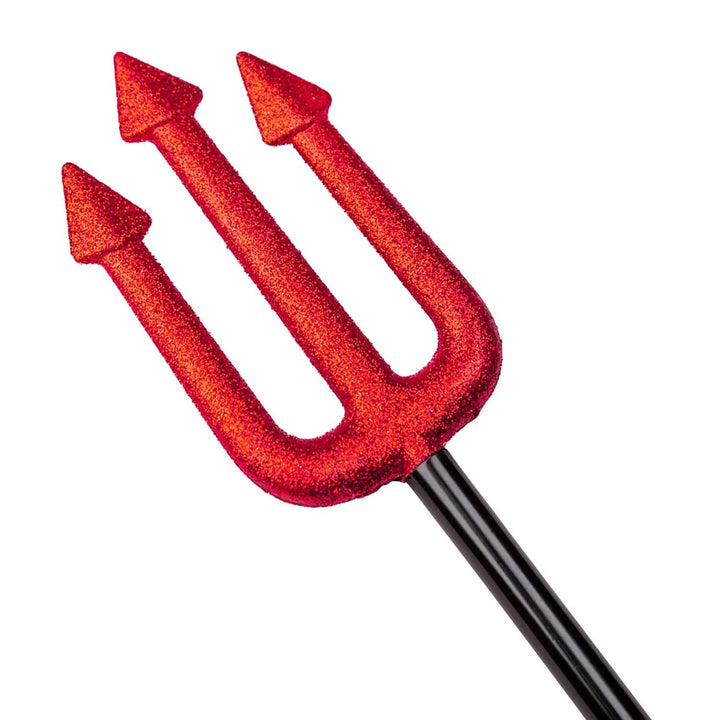 Close up of the top of a red glitter devils trident for Halloween fancy dress costumes