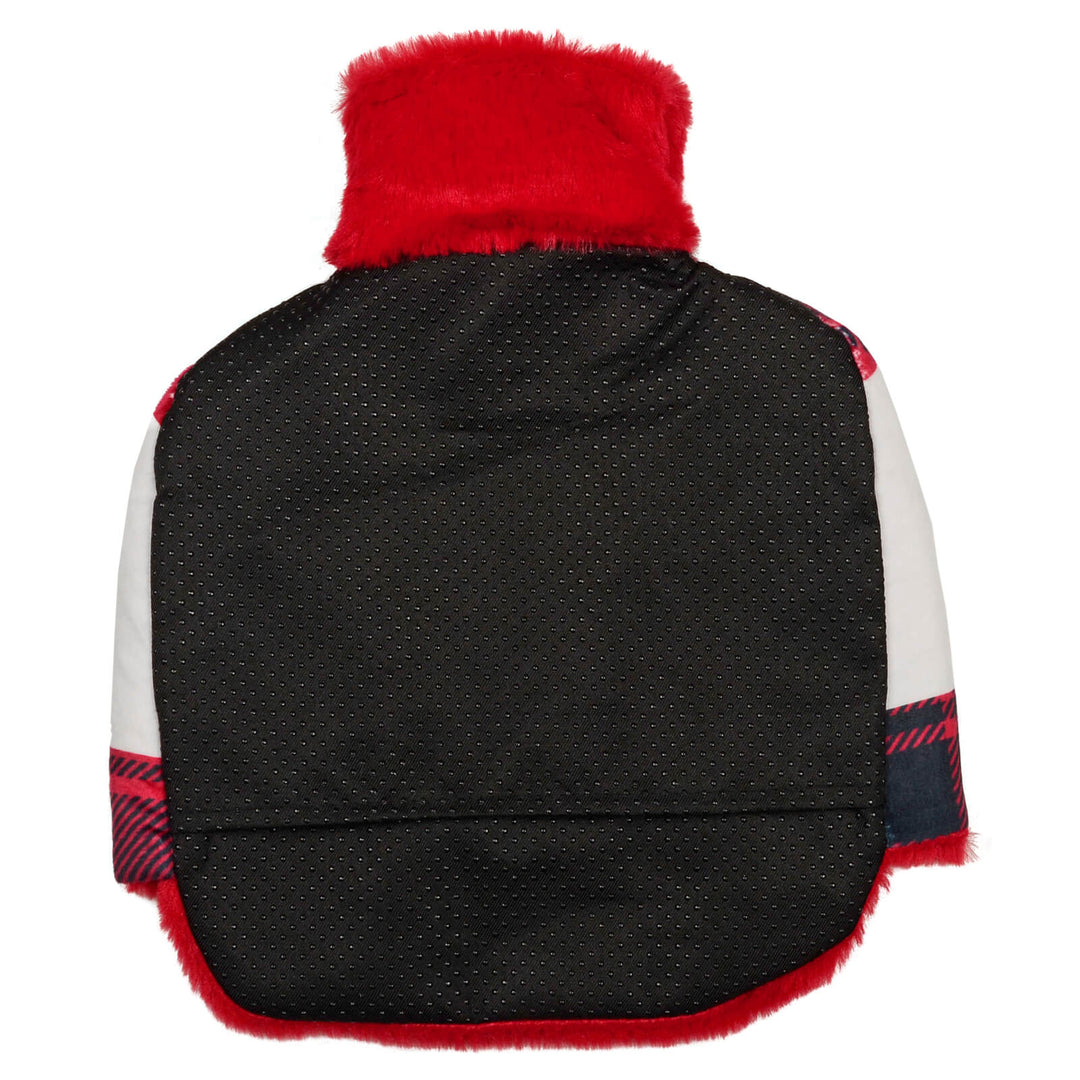 Base of a foot warmer hot water bottle showing non-slip gripper dots