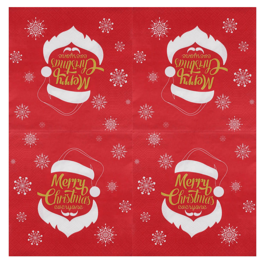 Red and white Christmas napkin unfolded to show each corner design