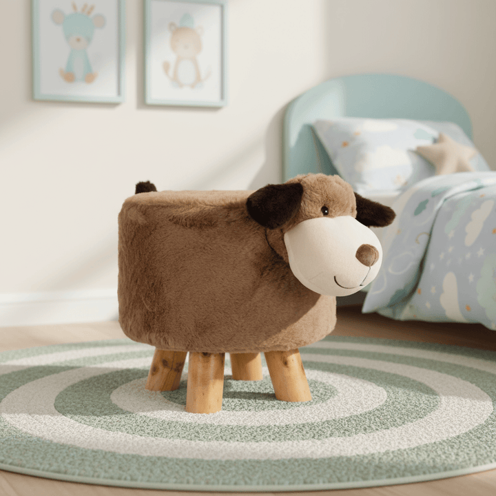 Children's room with a brown dog-shaped stool and framed pictures on the wall.