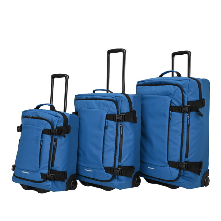 set of 3 suitcases from small to large side by side