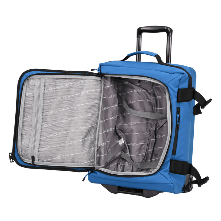 hodge and hodge suitcase open to reveal mesh storage pocket and main compartment with compression straps