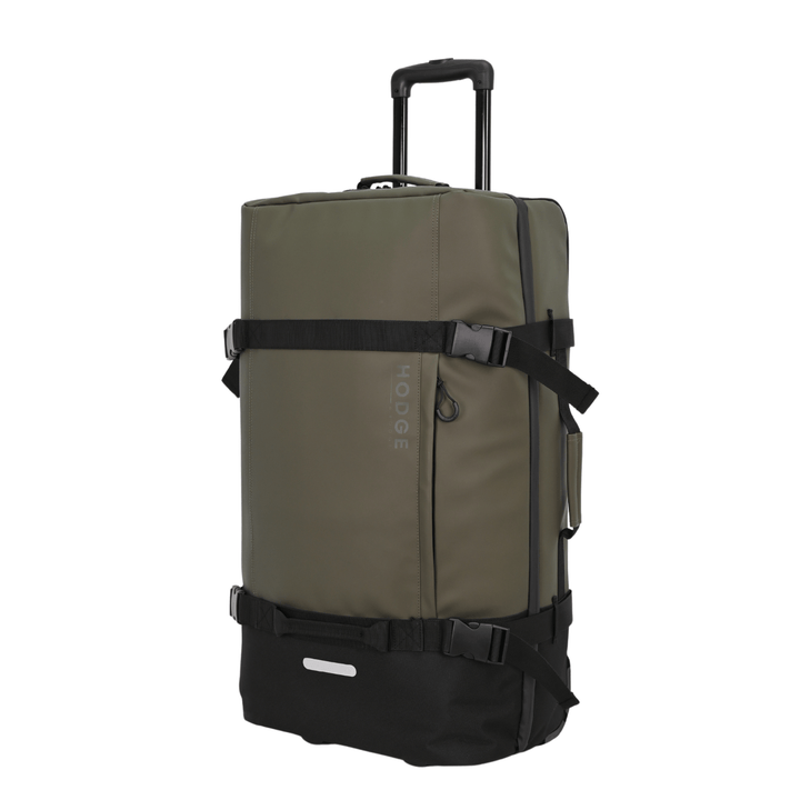 side view of large hodge and hodge suitcase with telescopic handle, security buckles and reflective details.