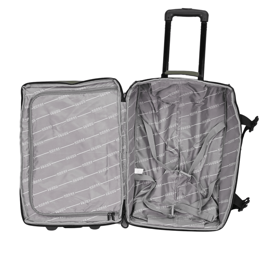 detail shot of suitcase interior with branded lining, compression straps and additional zipped compartment 