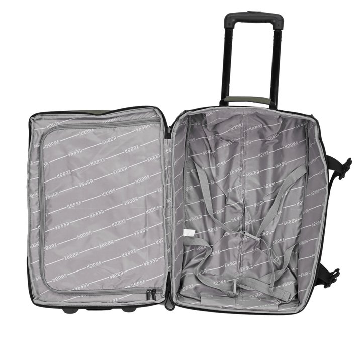 detail shot of suitcase interior with branded lining, compression straps and additional zipped compartment 