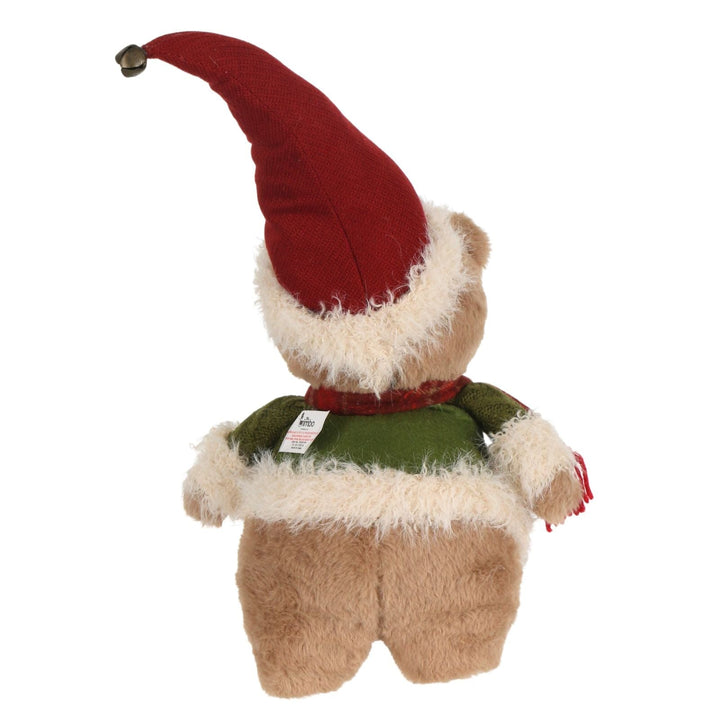 back view of plush teddy bear with red santa hat