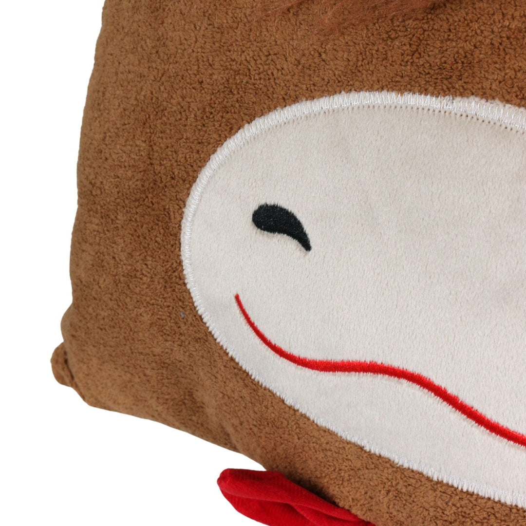 close up of highland cow cushion face with emboirdered details