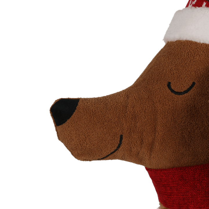 detail shot of plush black nose on christmas dog cushion