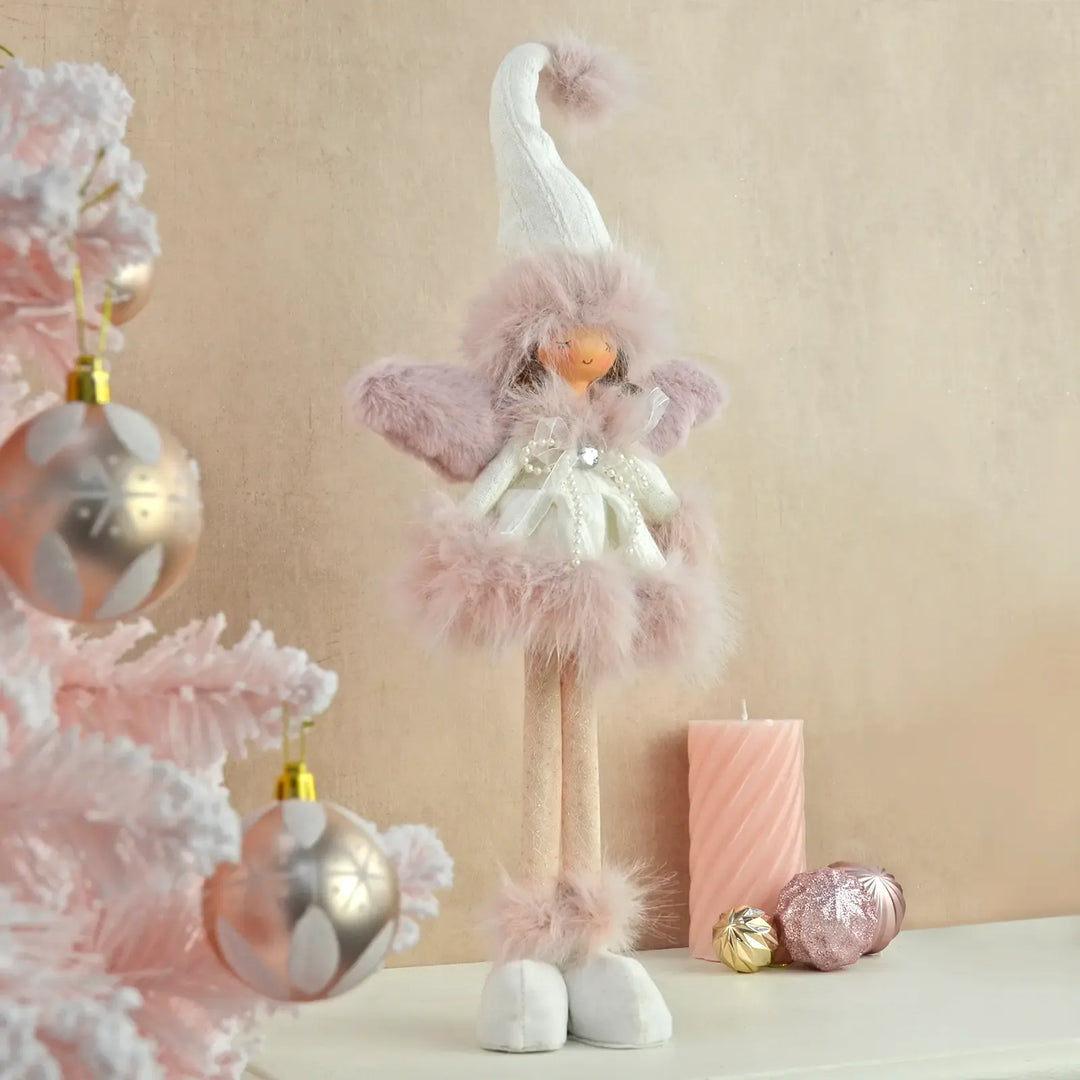 Pink and white Christmas fairy with pink Christmas tree and baubles