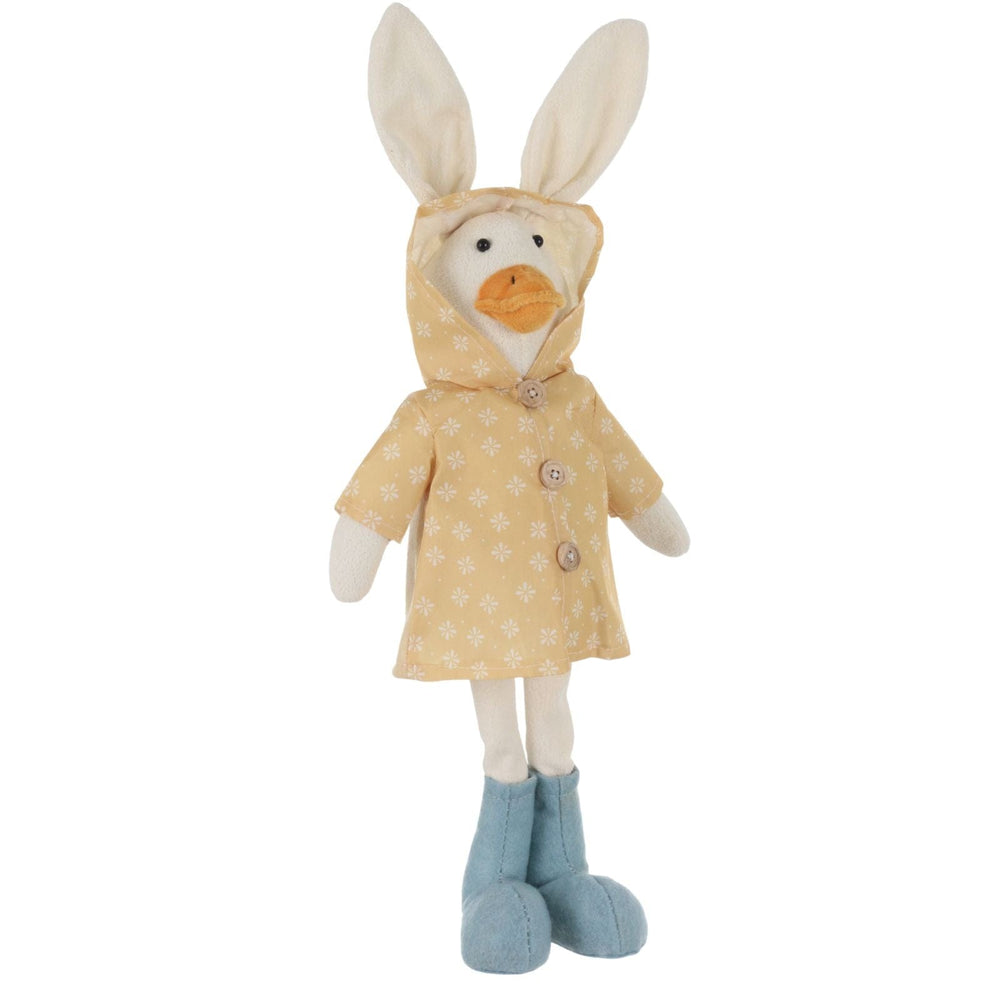 Stuffed toy duck with bunny ears wearing a yellow raincoat on a white background