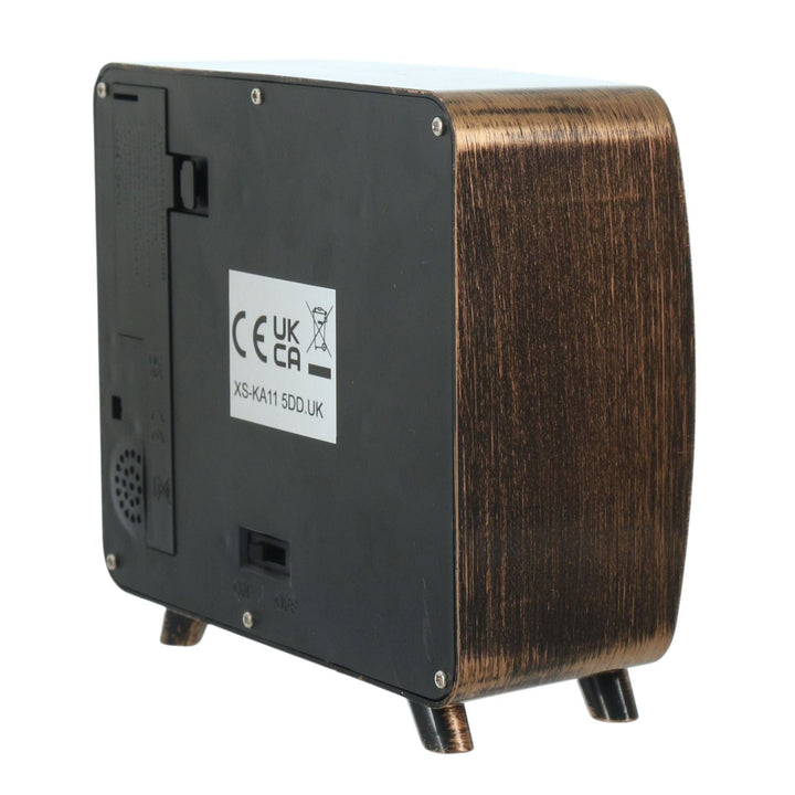 Back view of a wooden electronic device with certification label on a white background