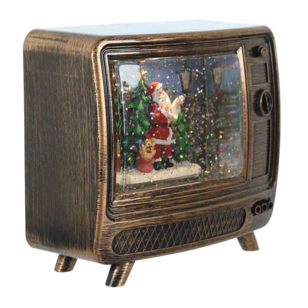 Vintage-style television with a Christmas scene inside on a white background