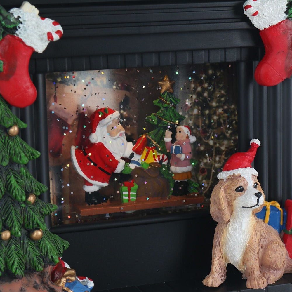 close up of glitter moving inside fireplace scene on ornament