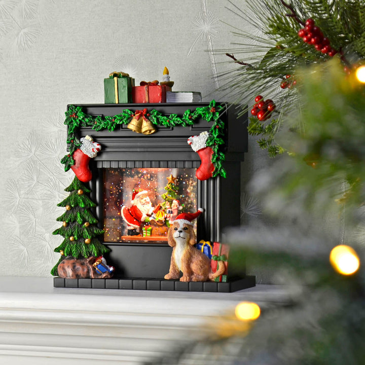 Santa glitter water spinner fireplace Christmas decoration with dog and presents